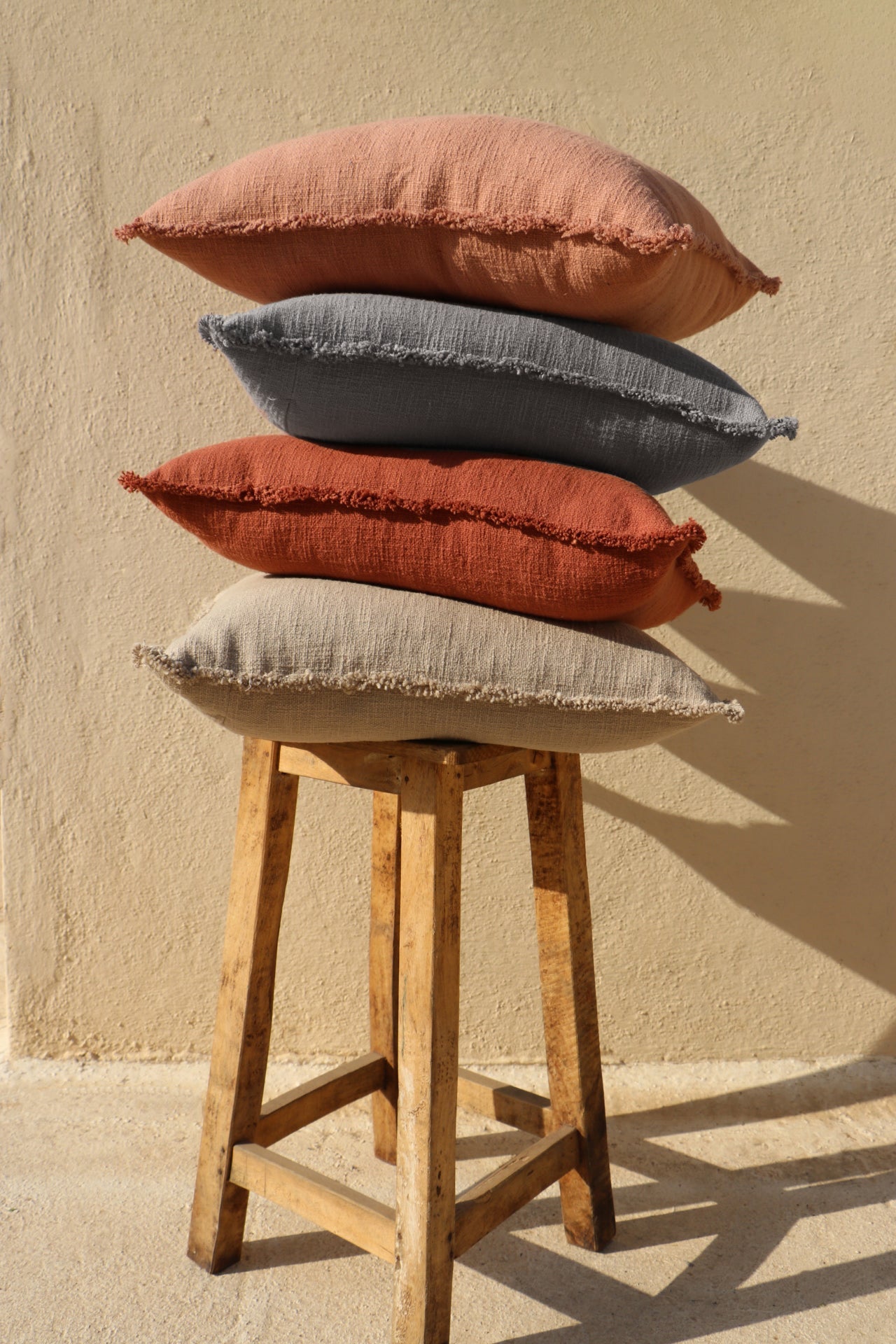 Organic Chic washed textured cotton solid lumbar pillow cover with frayed edges - NuStory