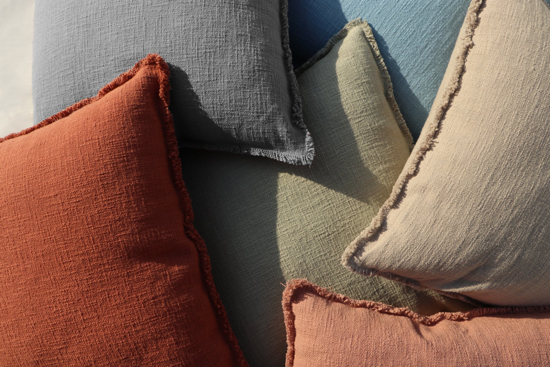 Organic Chic washed textured cotton solid lumbar pillow cover with frayed edges - NuStory